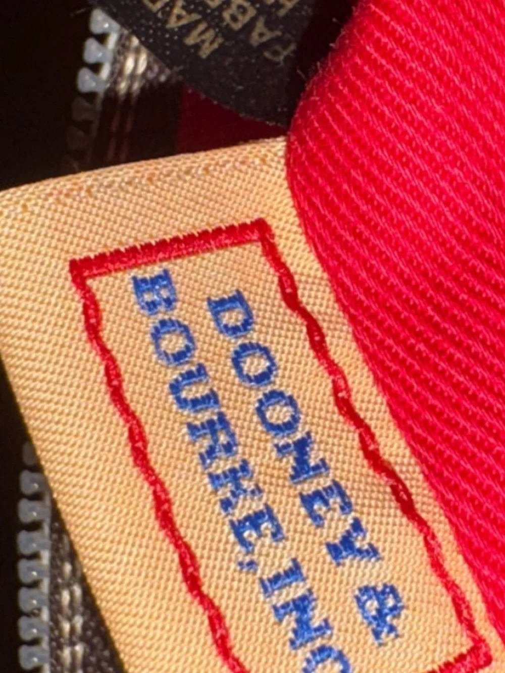 Dooney & Bourke reposhing this